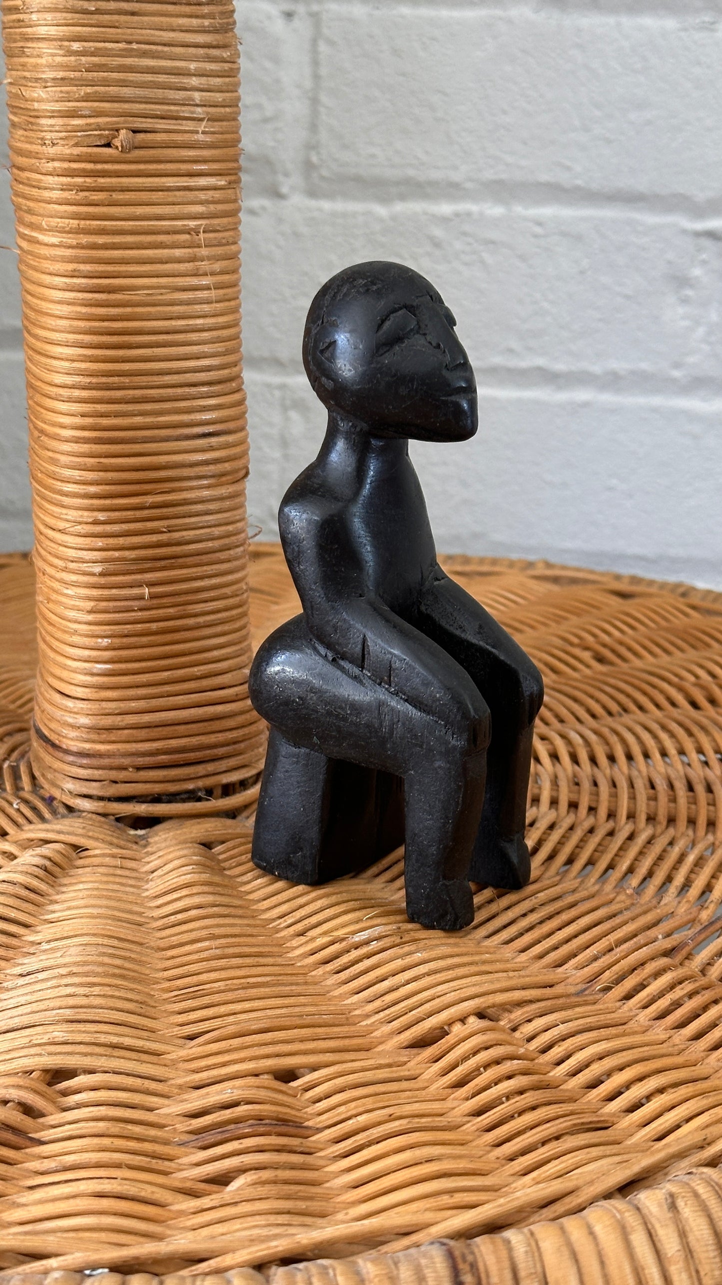 Carved Wooden Sculpture of Seated Man