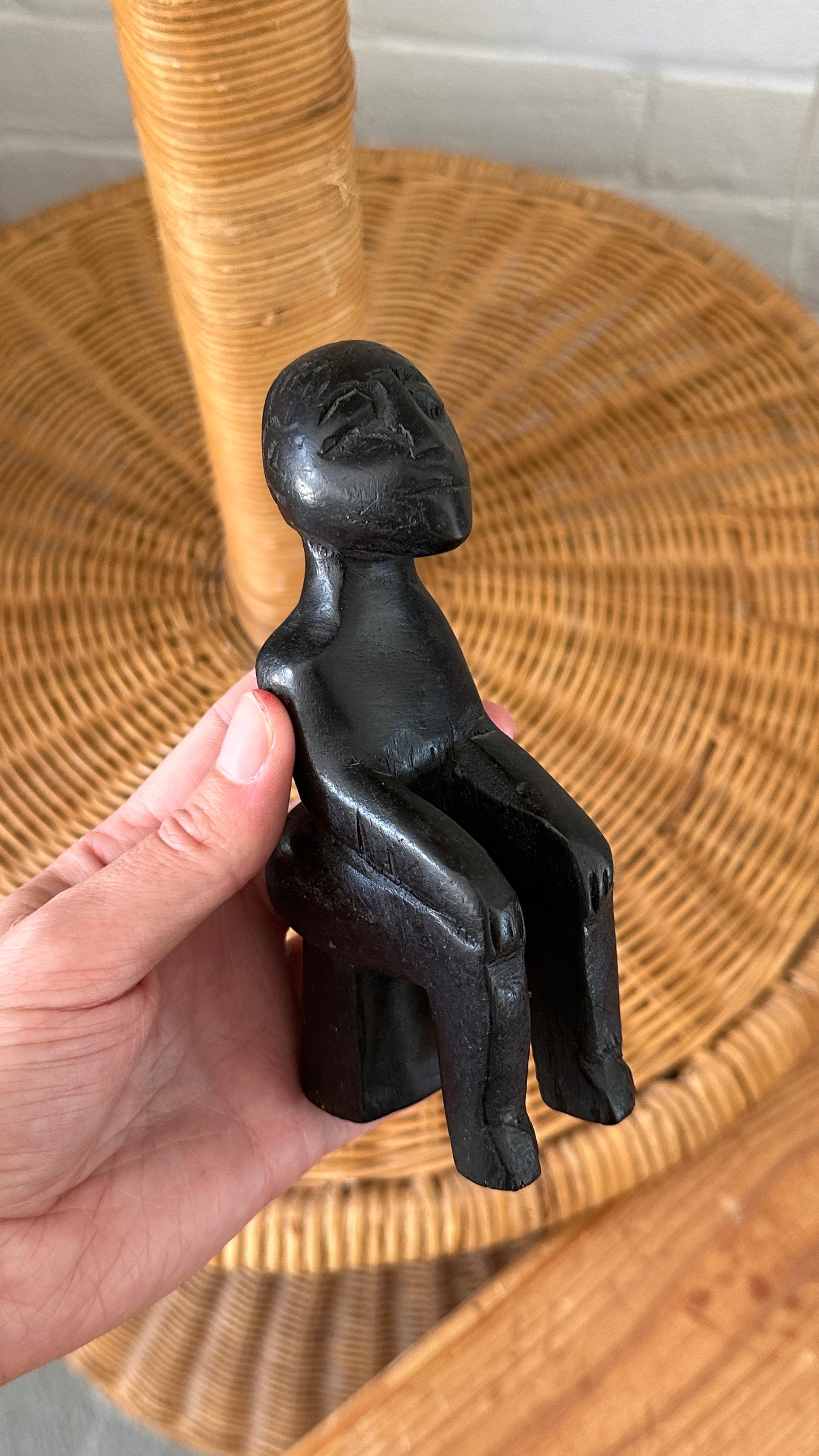 Carved Wooden Sculpture of Seated Man