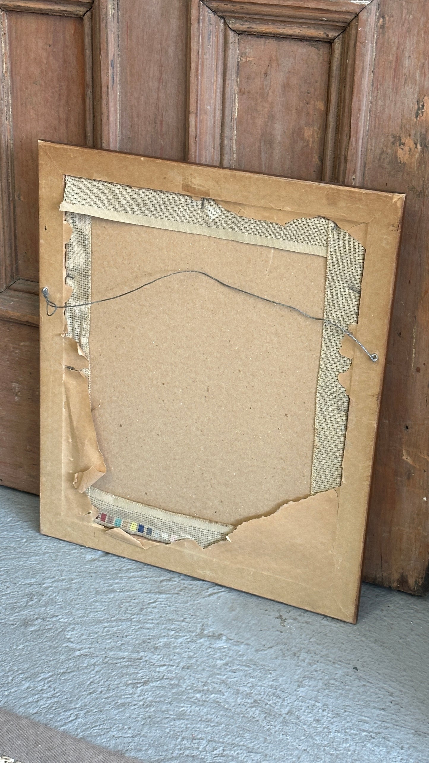 Framed Needlepoint of Woman and Fireplace