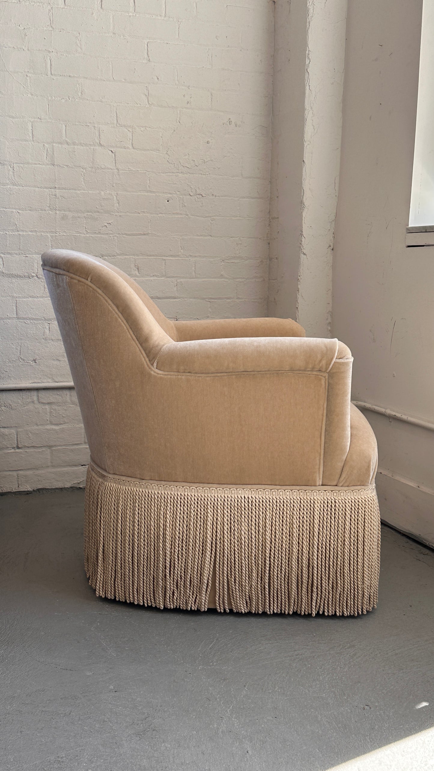 Upholstered Roll Arm Club Chair with Tassel Skirt