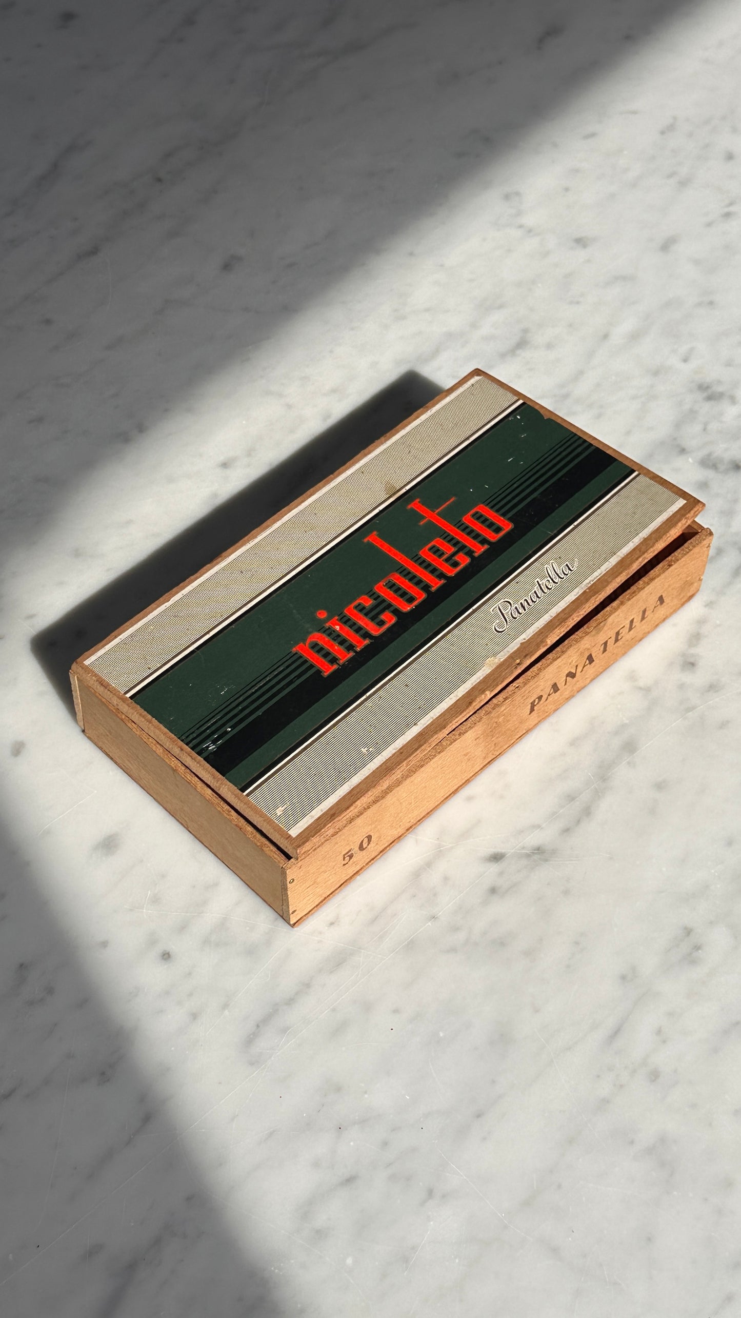 Collection of Advertising / Bar Tokens in Vintage Nicoleto Cigar Box