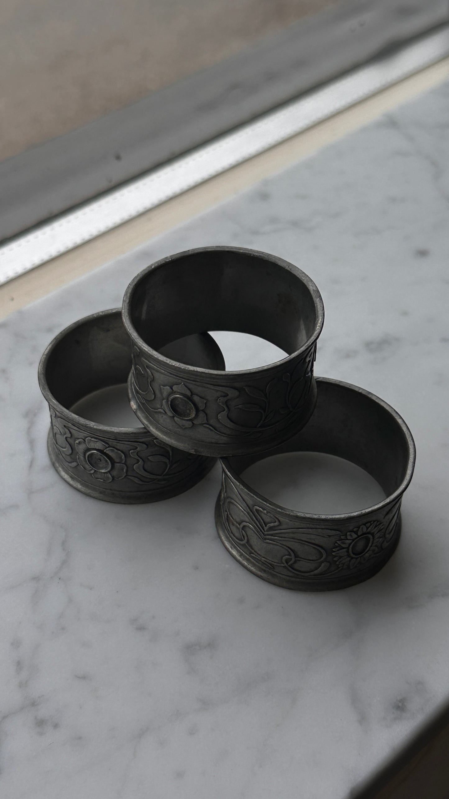 Set of 3 Silver Napkin Rings with Embossed Floral Motifs