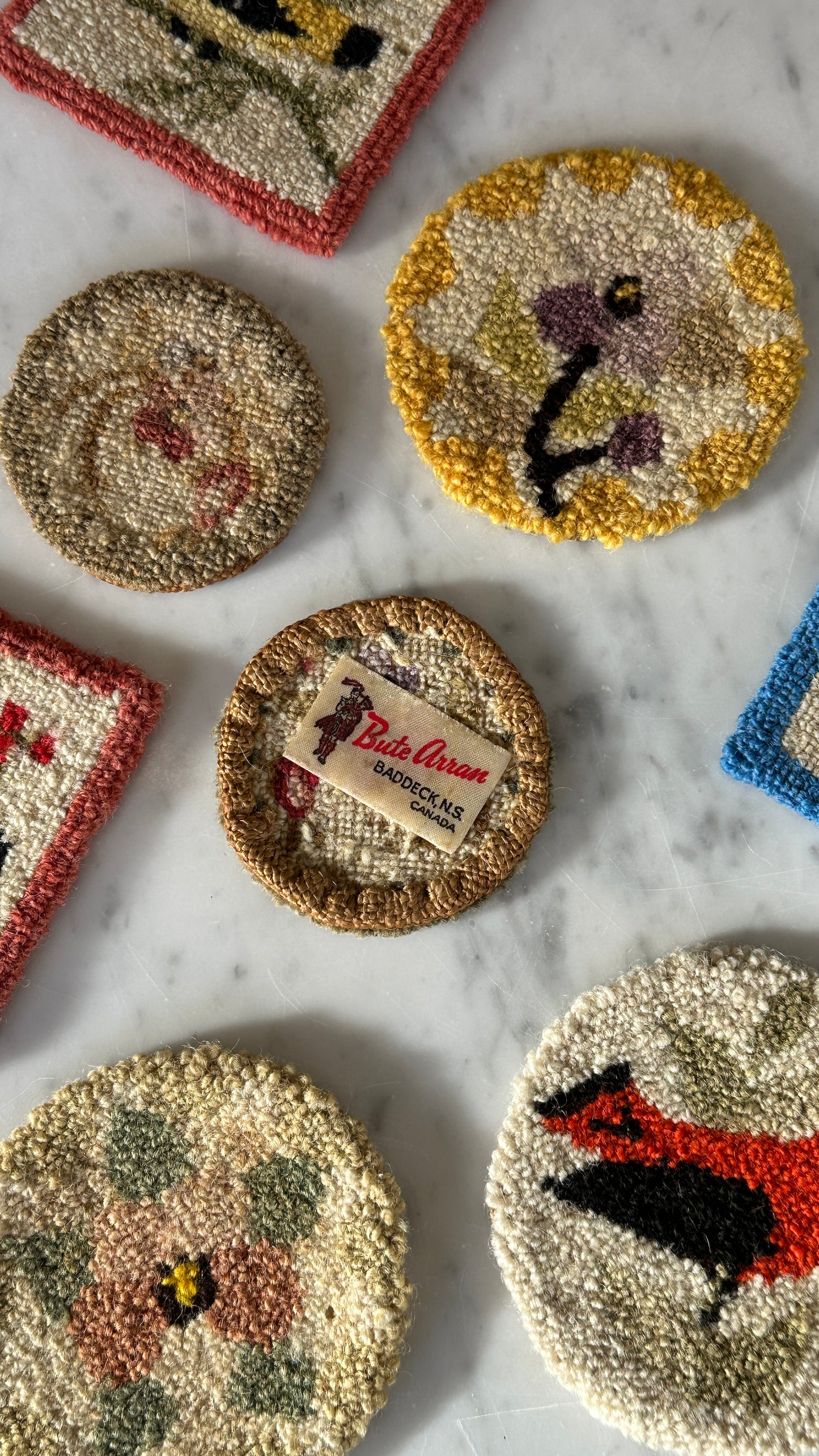 Collection of 8 Chéticamp Hooked Coasters