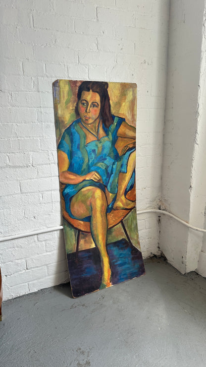 Seated Woman Painting on Board