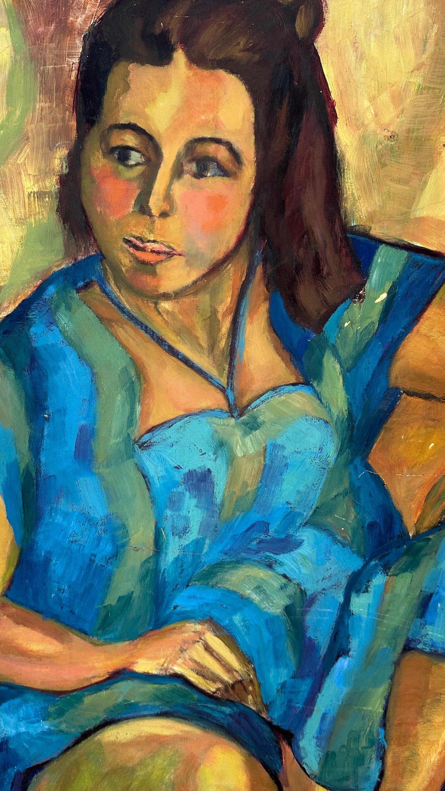 Seated Woman Painting on Board