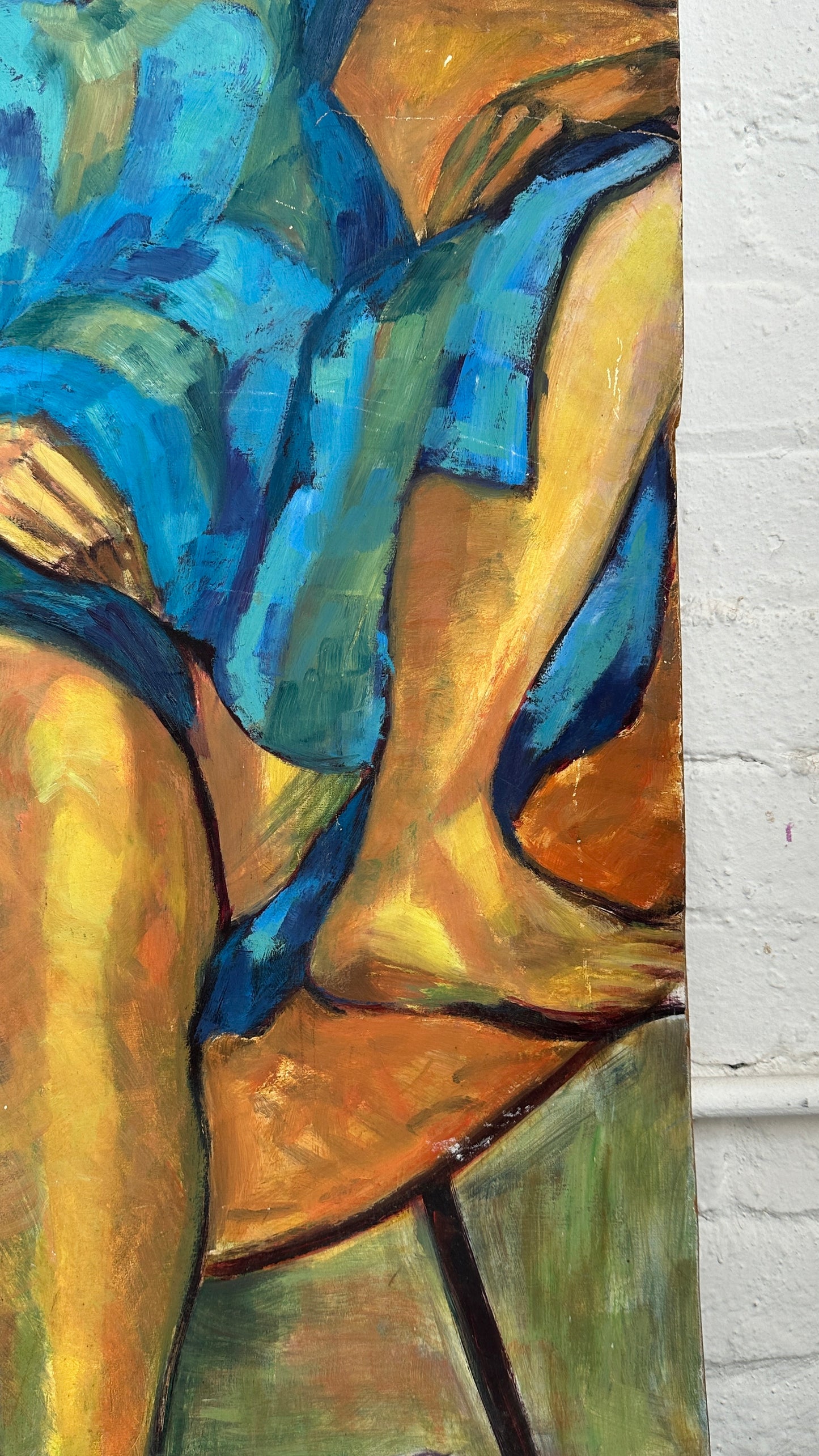 Seated Woman Painting on Board