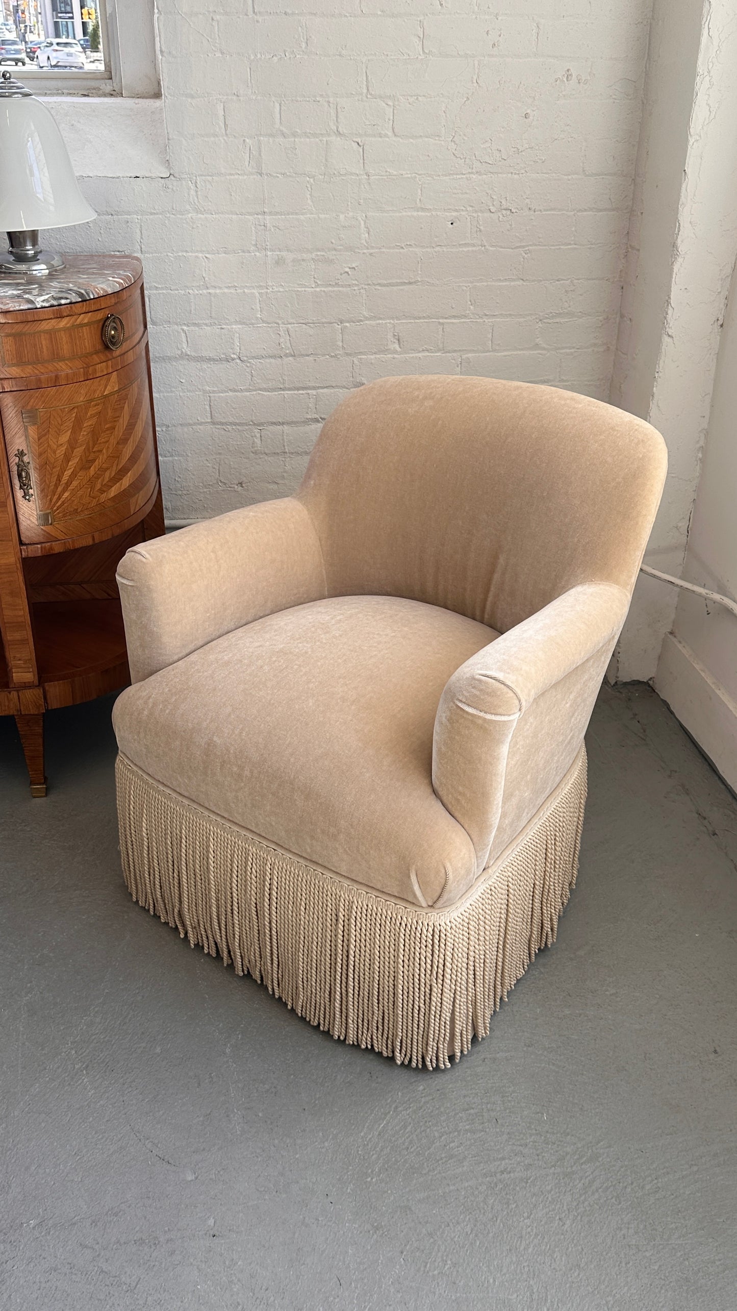 Upholstered Roll Arm Club Chair with Tassel Skirt