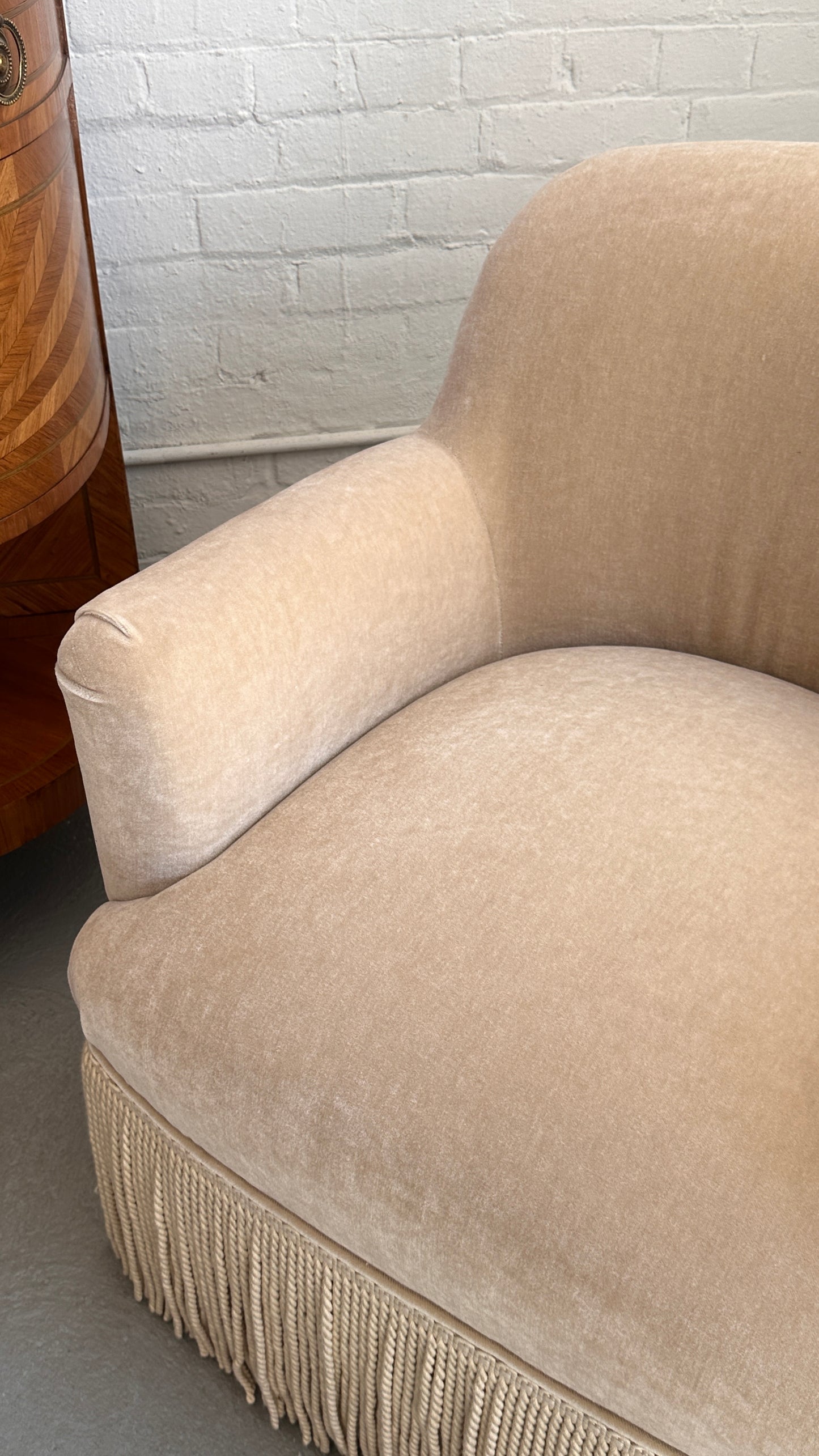 Upholstered Roll Arm Club Chair with Tassel Skirt