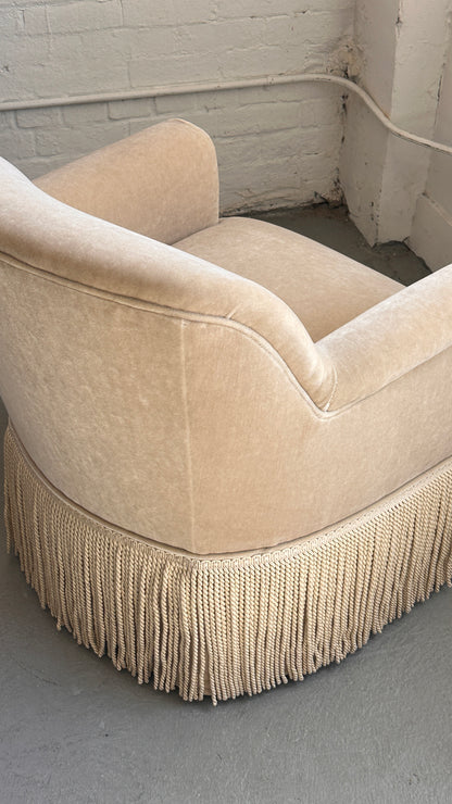Upholstered Roll Arm Club Chair with Tassel Skirt
